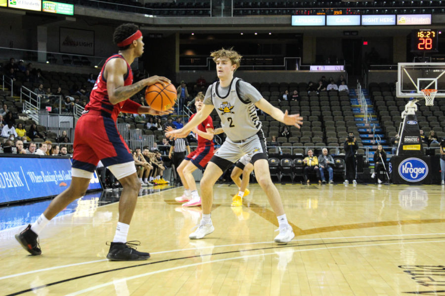 NKU guard Sam Vinson (2) defends against Detroit Mercy in the quarterfinals of the Horizon League Tournament.