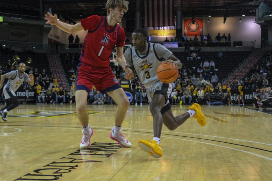 NKU guard Marques Warrick (3) drives to the lane against Detroit Mercy on Thursday in the Horizon League Tournament quarterfinals.