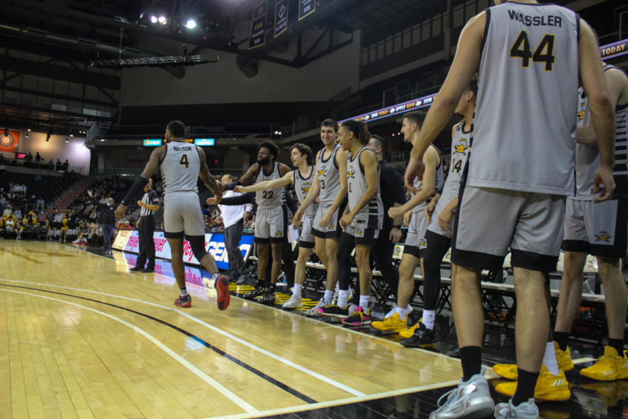 Forward Adrian Nelson (4) celebrates an and-one basket against Detroit Mercy in the Horizon League quarterfinals.