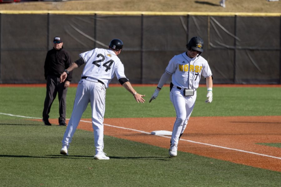 NKU infielder John Odom (7) rounds third base after a home run against Butler.