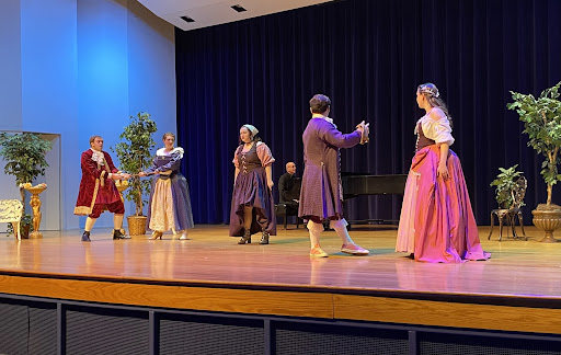 Cast members performing in the Greaves Concert Hall.