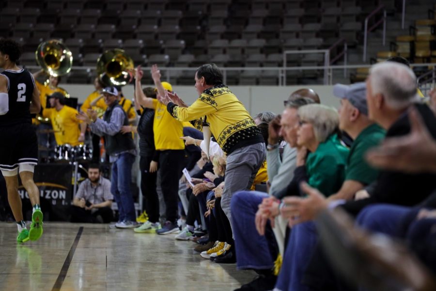 An NKU fan cheers on the Norse during the Horizon League Tournament quarterfinals at Indiana Farmers Coliseum.
