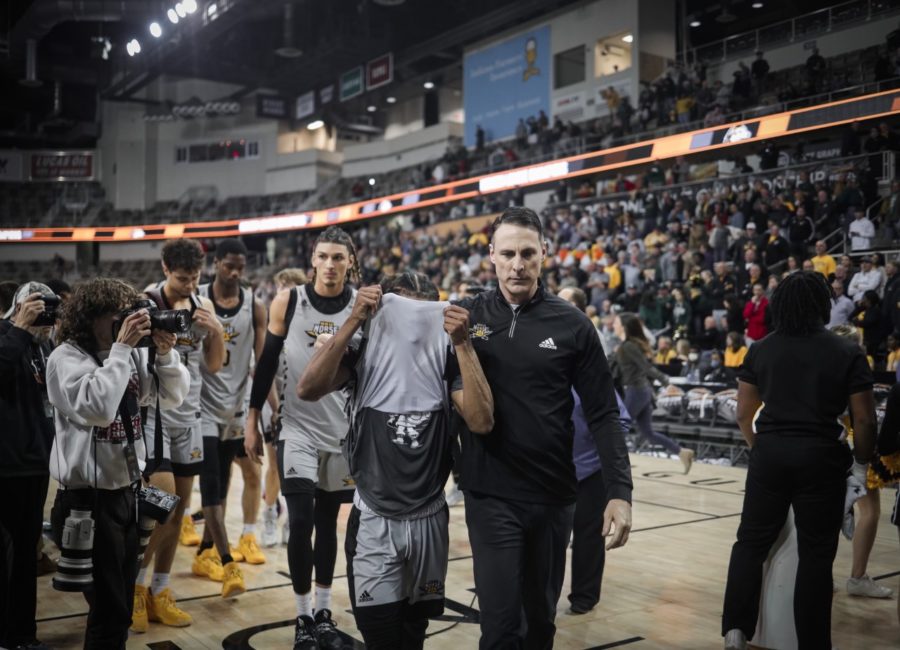 NKU players leave the court following the loss to Wright State in the Horizon League Tournament championship game at Indiana Farmers Coliseum.