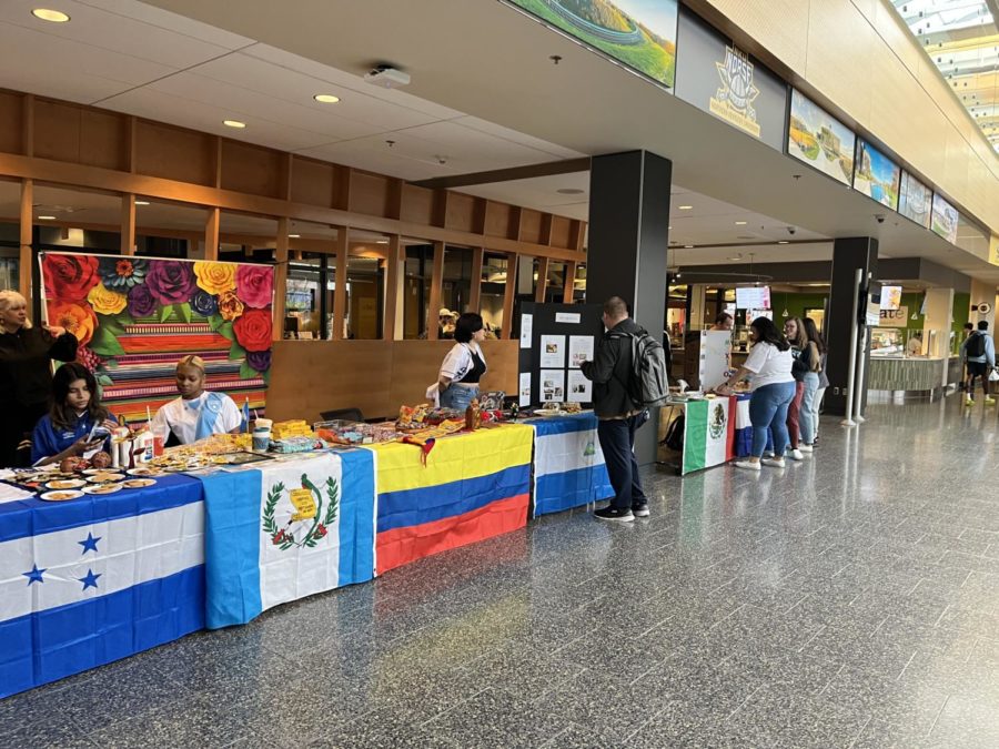 Tables showcasing different food and other souvenirs from some countries located in Central and South America.