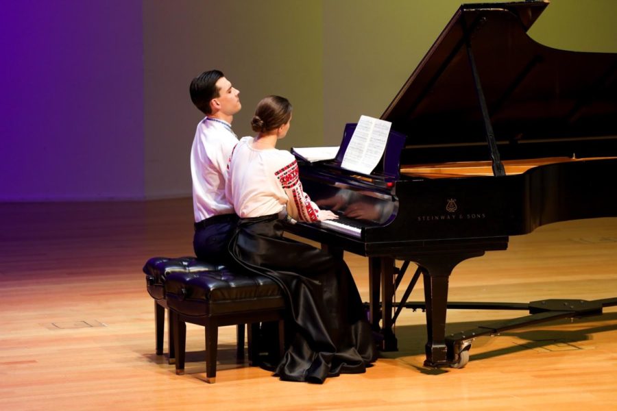 Anna and Dmitri Shelest played piano together as the Shelest Piano Duo.