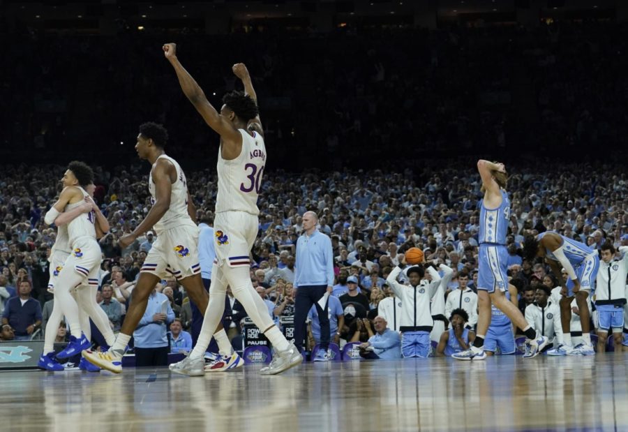 Kansas players celebrate after a college basketball game against North Carolina in the finals of the Mens Final Four NCAA tournament, Monday, April 4, 2022, in New Orleans. (AP Photo/David J. Phillip)