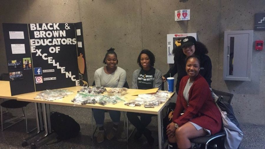 Students of the Black and Brown Educators of Excellence program tabling for the organization. 