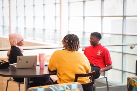 SGA President Daniel Myers and Vice President Jaelynn “Jae” Gentry talking to a student during the 2022 SGA election season.