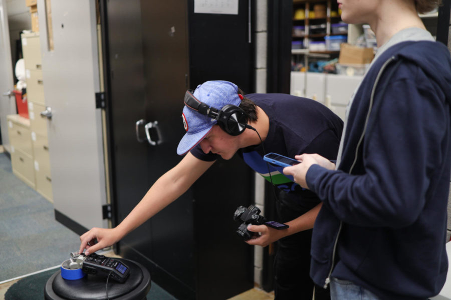 Dylan Boling sets up equipment as he prepares to shoot video. 