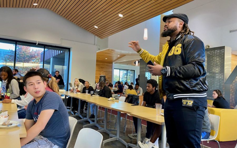 A student advocate voices their concerns to the panel Monday night during the Open Dining Forum presented by the Residence Hall Association.