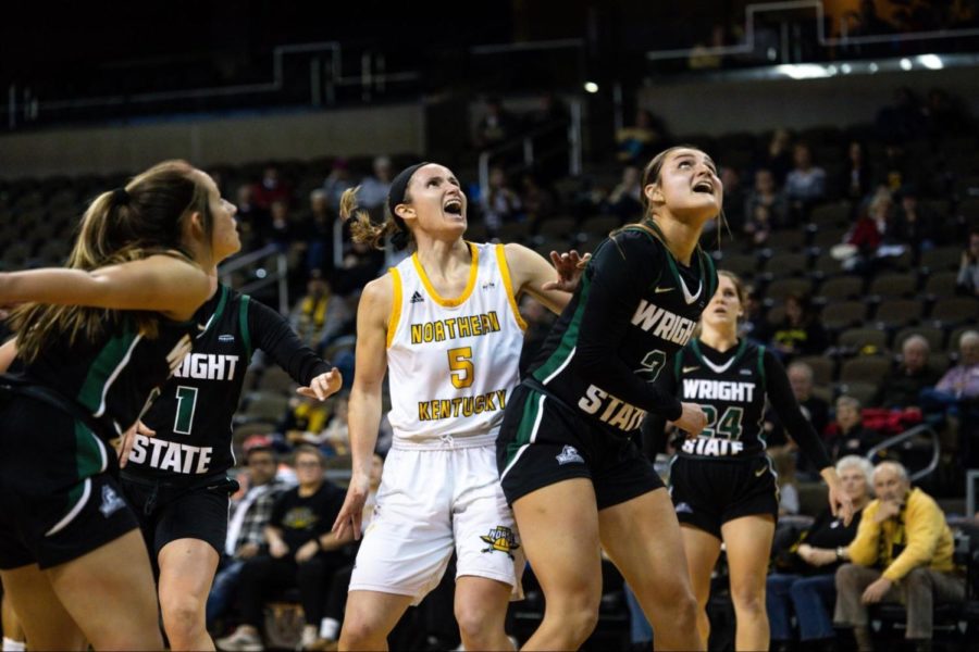 Norse guard Lindsey Duvall battles with Wright State’s Cara VanKempen (2) for positioning to grab a rebound. Duvall would record her seventh double-double of the year Wednesday night, scoring 25 points and grabbing 13 boards in NKU’s win over the Raiders.
