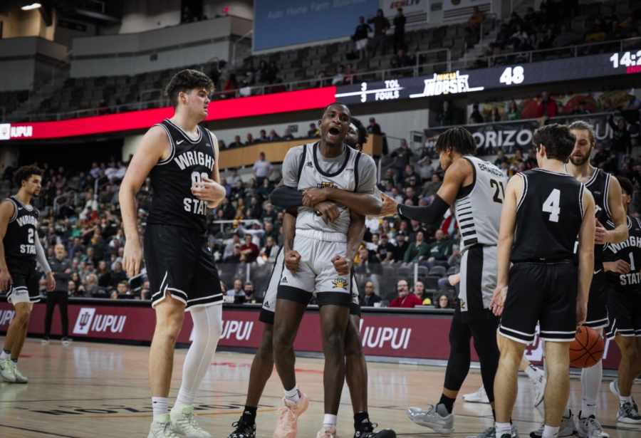 Marques Warrick and Trevon Faulkner celebrate after a play during the 2022 Horizon League Championship game. The Norse enter their matchup with Wright State in a three-way tie for first in the Horizon League while Wright State is 0-2 in conference play.