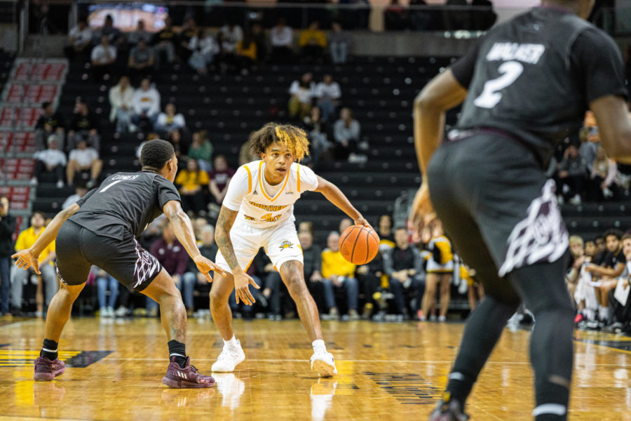 A’lahn Sumler looks for a weak spot in Eastern Kentucky’s defense in the second half of the NKU men’s basketball teams 64-61 win over the Colonels Wednesday night. Sumler finished with 12 points on the night, all of them coming off three-point shots.