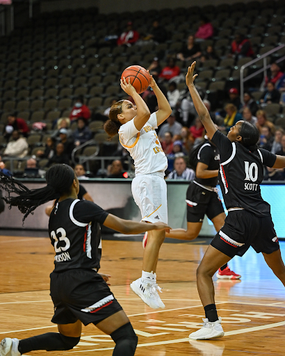 Ivy Turner goes up for a layup over Cincinnati’s Jadyn Scott in the second half of NKU’s 72-52 victory over the Bearcats. Turner and Lindsey Duvall cemented themselves into Norse lore Wednesday night as both surpassed the 1,000 point mark on their respective careers.