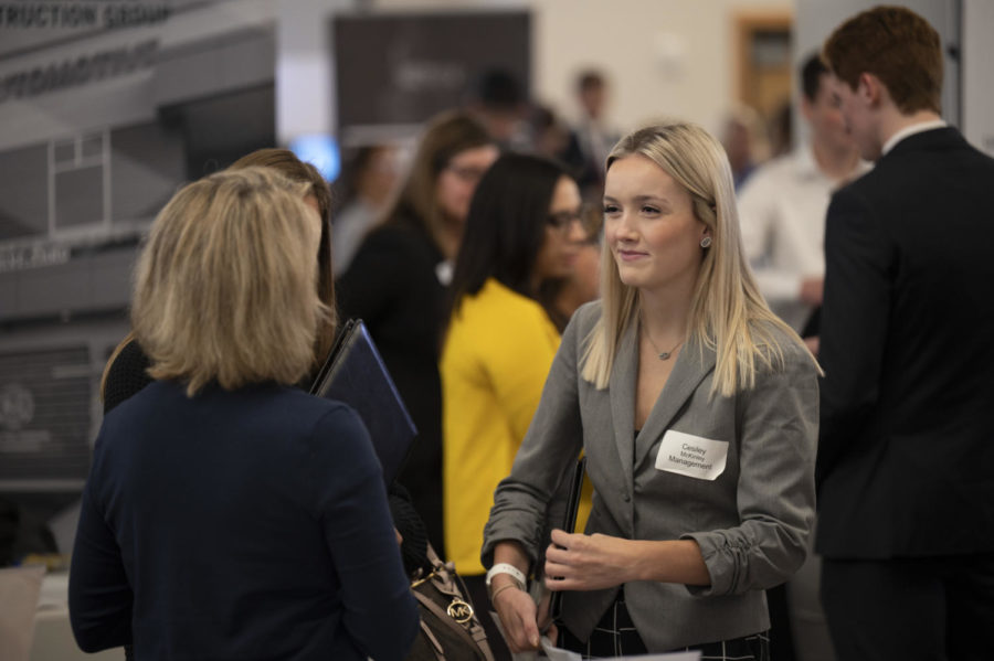 A student talks with an employer at Career Expo. 