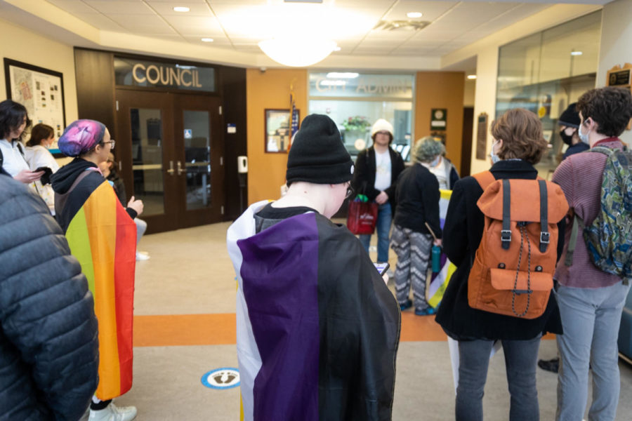 LGBTQA+ students gathered in front of the Highland Heights City Council office after marching from the Student Union.