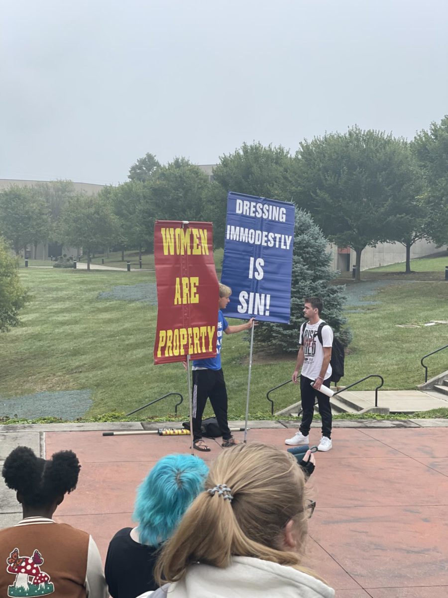 A group of demonstrators gathered around Loch Norse on Friday, Sept. 29.