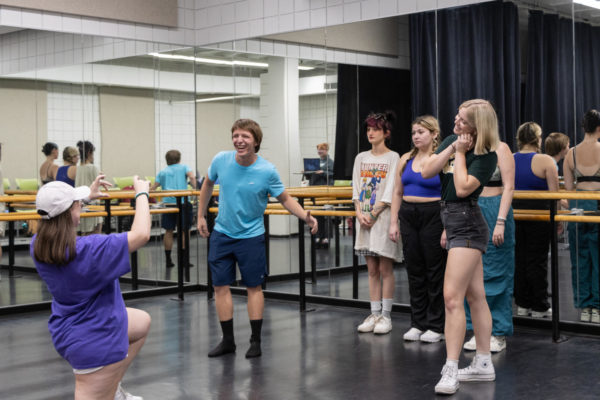 The cast of The Rocky Horror Picture Show rehearsing in the Fine Arts Center. 