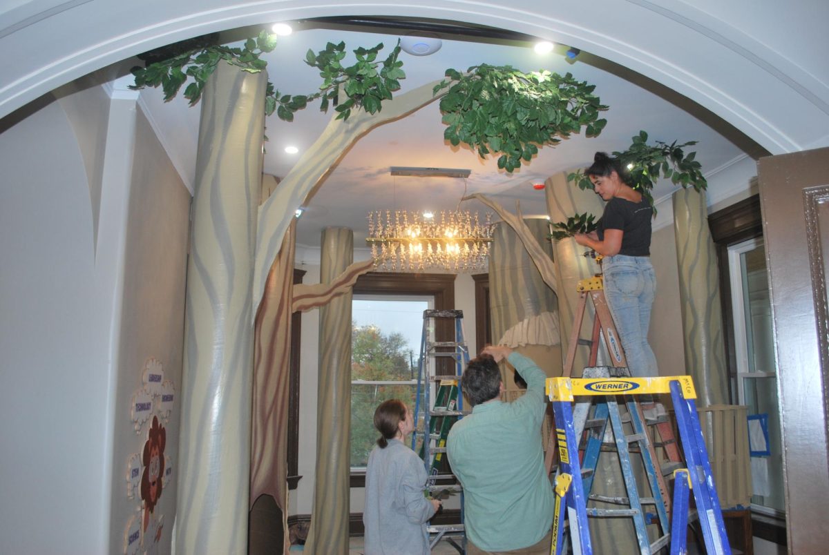 Brad McCombs and his students working on “Levi’s Learning Area.”