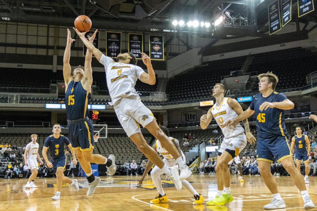 NKU Sophomore LJ Wells leaps for the ball during Wednesday nights match-up.