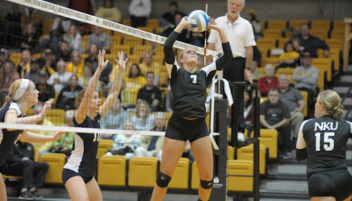 Jenna Schreiver playing volleyball as a setter at NKU. 