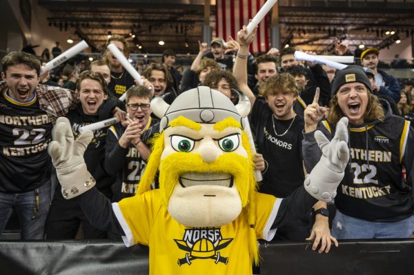 Fans in NKU’s student section cheer with excitement at the homecoming game in January 2023.