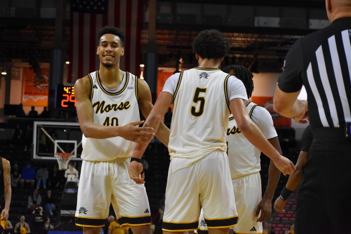 Keeyan Itejere smiling during the game against Milwaukee.