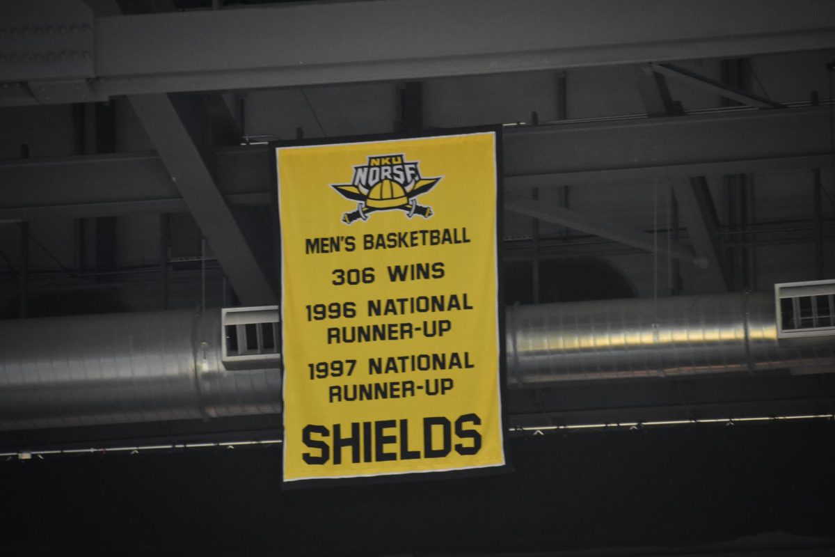 A banner revealed at Saturday nights game recognized former mens basketball head coach Ken Shields.