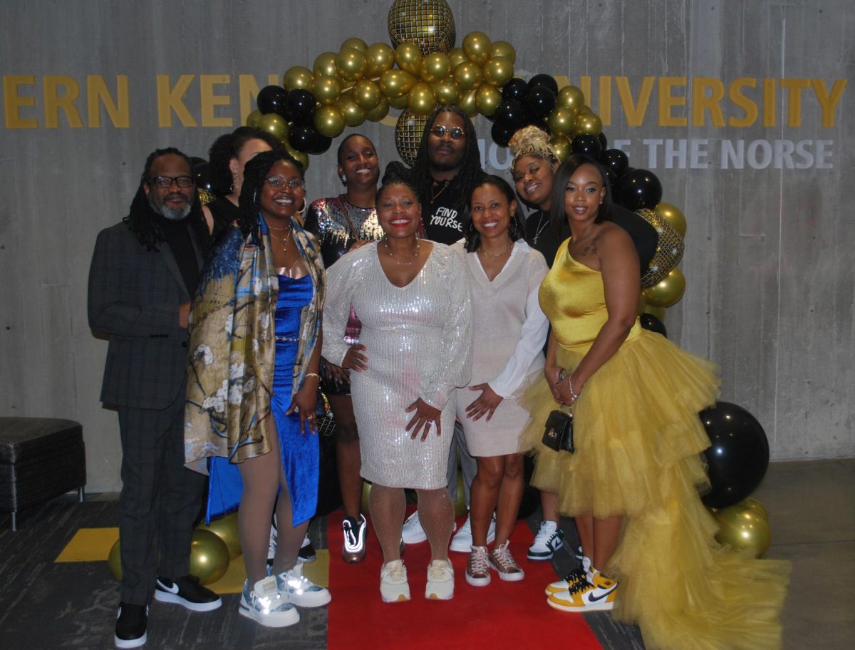 Member of the Black Alumni Council who were in attendance gather for a photo.