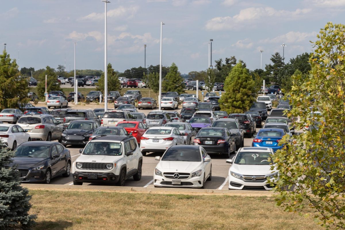 Rows of cars line the university parking lots.