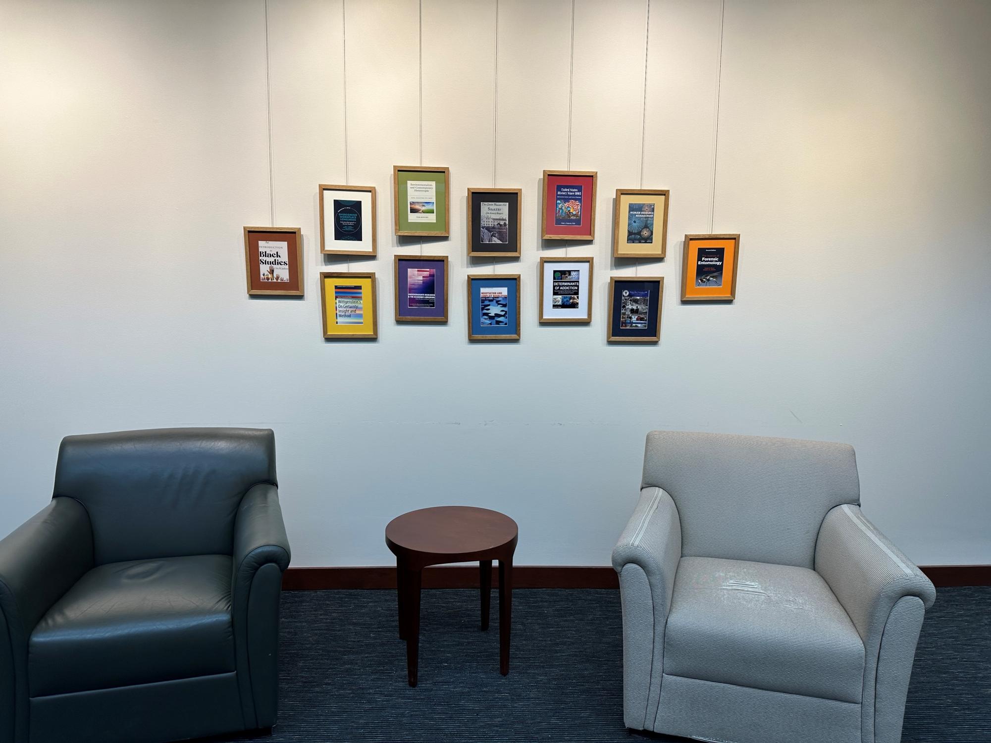 Books celebrated at the Book Writer’s Celebration hang on the wall of the Eva G. Farris Reading Room in Steely Library. (Provided by Dr. Samantha Langley-Turnbaugh)