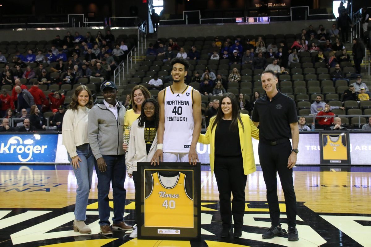 Itejere being recognized on a senior night. 