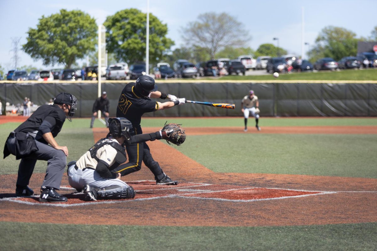 Senior Brennan Rowe (21) launched one home run and recorded four RBIs against Oakland.