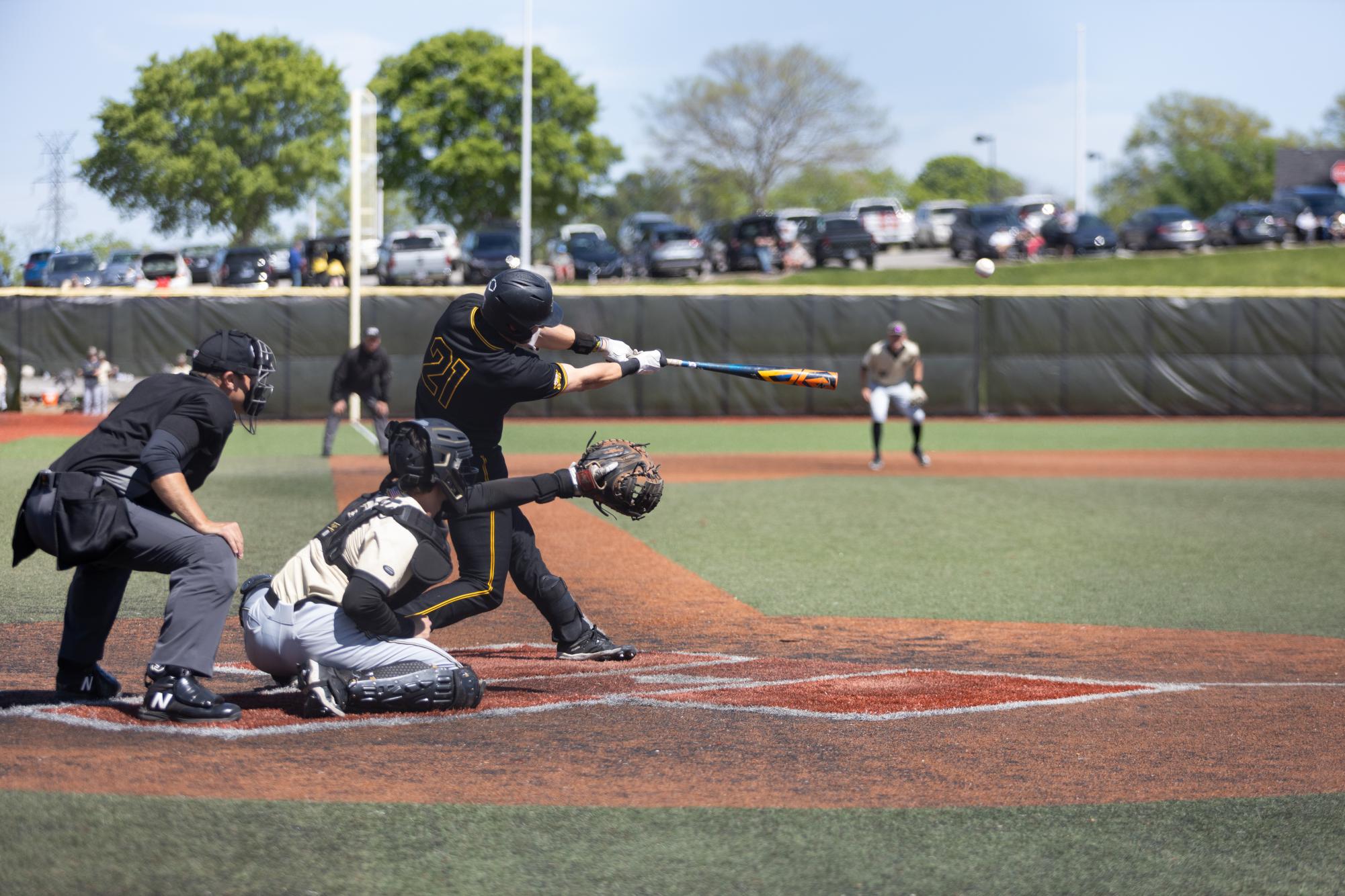 Senior Brennan Rowe (21) launched one home run and recorded four RBIs against Oakland. 