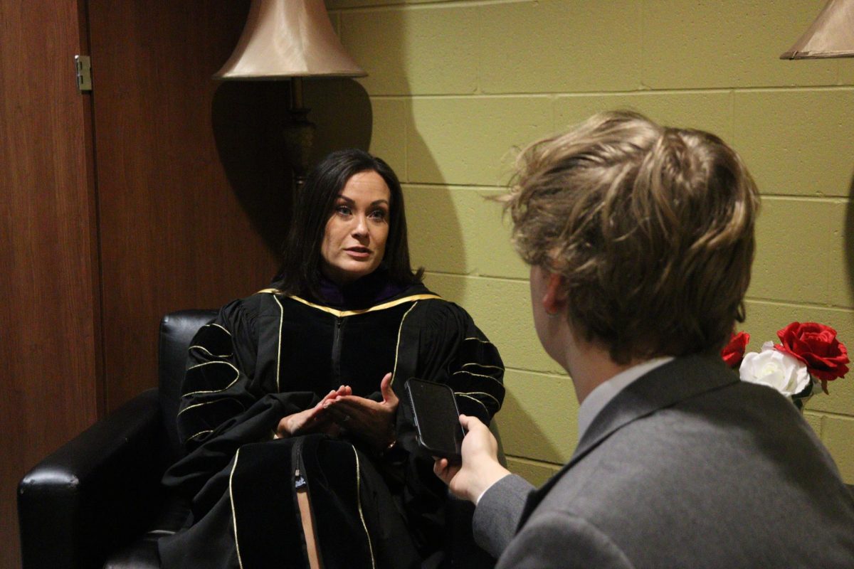 Lieutenant Governor Jacqueline Coleman speaking to Northerner Editor-In-Chief Henry Crawford before her Chase College of Law commencement speech. 