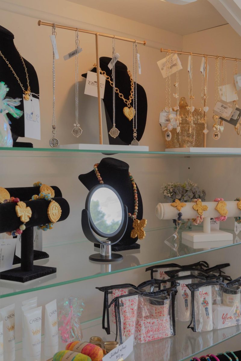 The store has plenty of accessories to choose from, including charm necklaces and makeup bags.