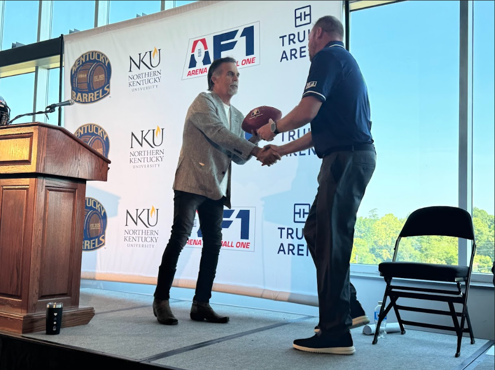 AF1 commissioner Jeff Fisher (left) shanking hands with owner of the Kentucky Barrels Corey Cunningham (right). 