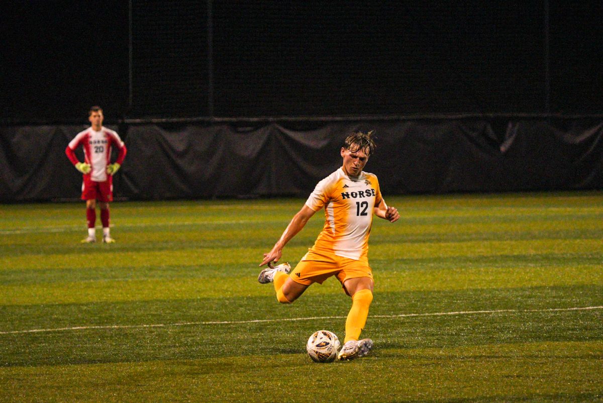 Caleb Frakes (12) playing a cross ball.