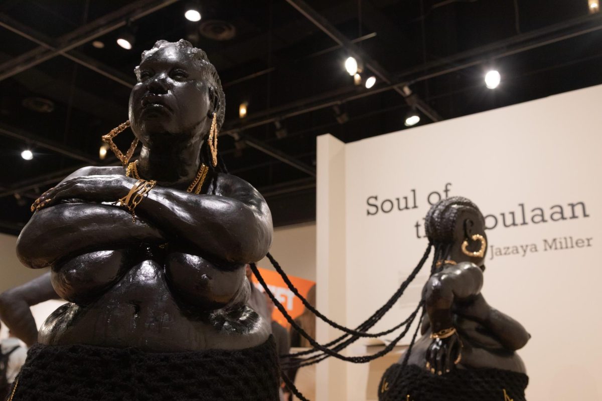 Each of Miller’s women is adorned with gold jewelry and crocheted skirts.