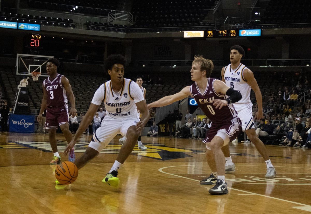 Senior Dan Gherezgher (0) driving into the lane on Turner Buttry (0). Gherezgher put up a team-high 19 points, going 7-14 from the floor and 5-9 from three. 