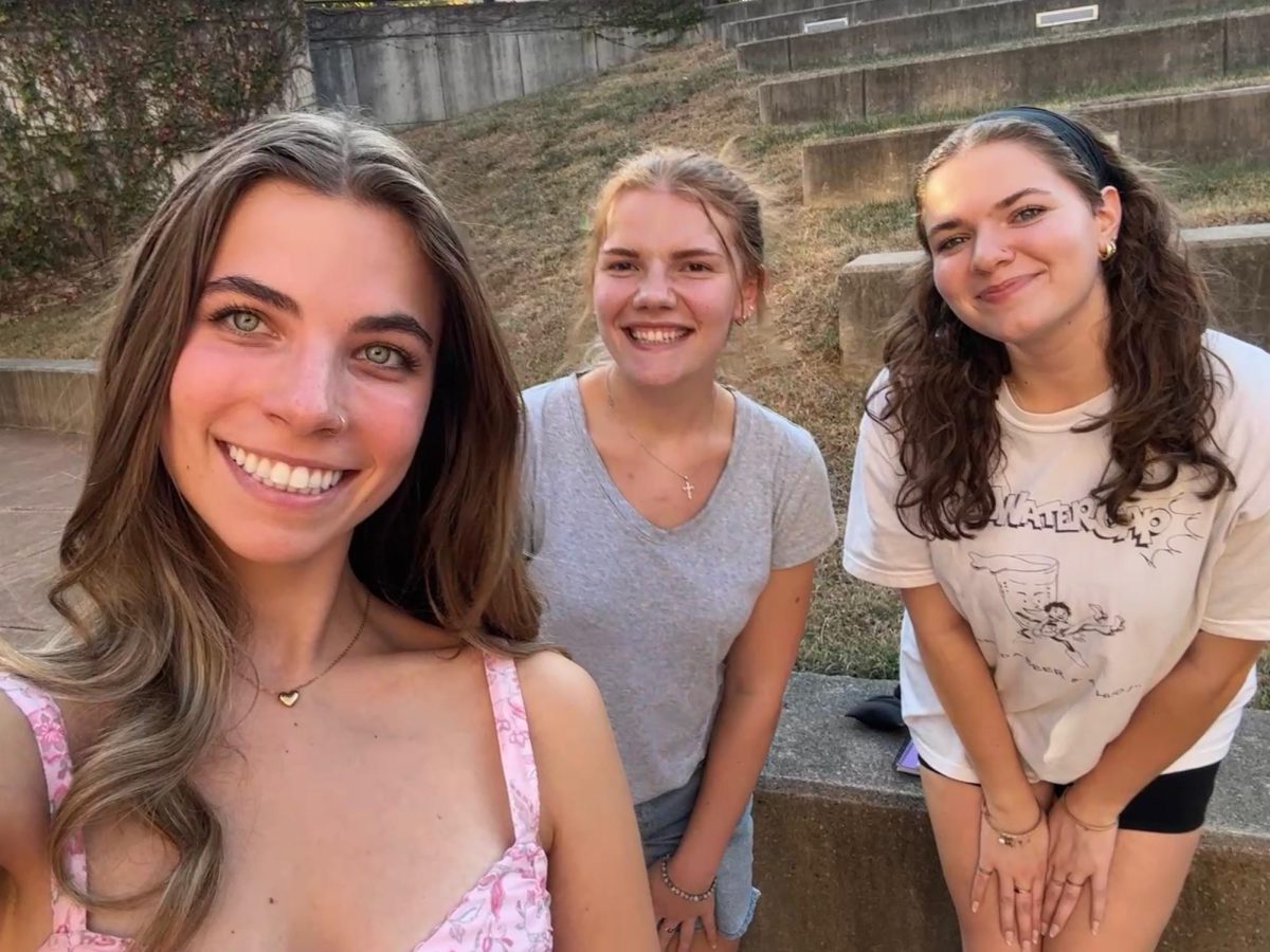 (from left to right): Ella Rinehard, Holly Keuper and Erin Senn set up for interviews preceding an Oklahoma! rehearsal. 
