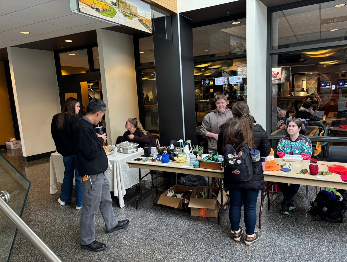 Vendors set up inside the student union on Thursday for the first ever Norse Holiday Marketplace. 