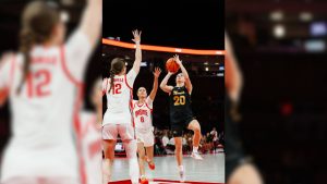 Karina Bystry (20) going up for the floater against a tough Ohio State defense. Bystry finished with 21 points, three rebounds and four assists in the loss.