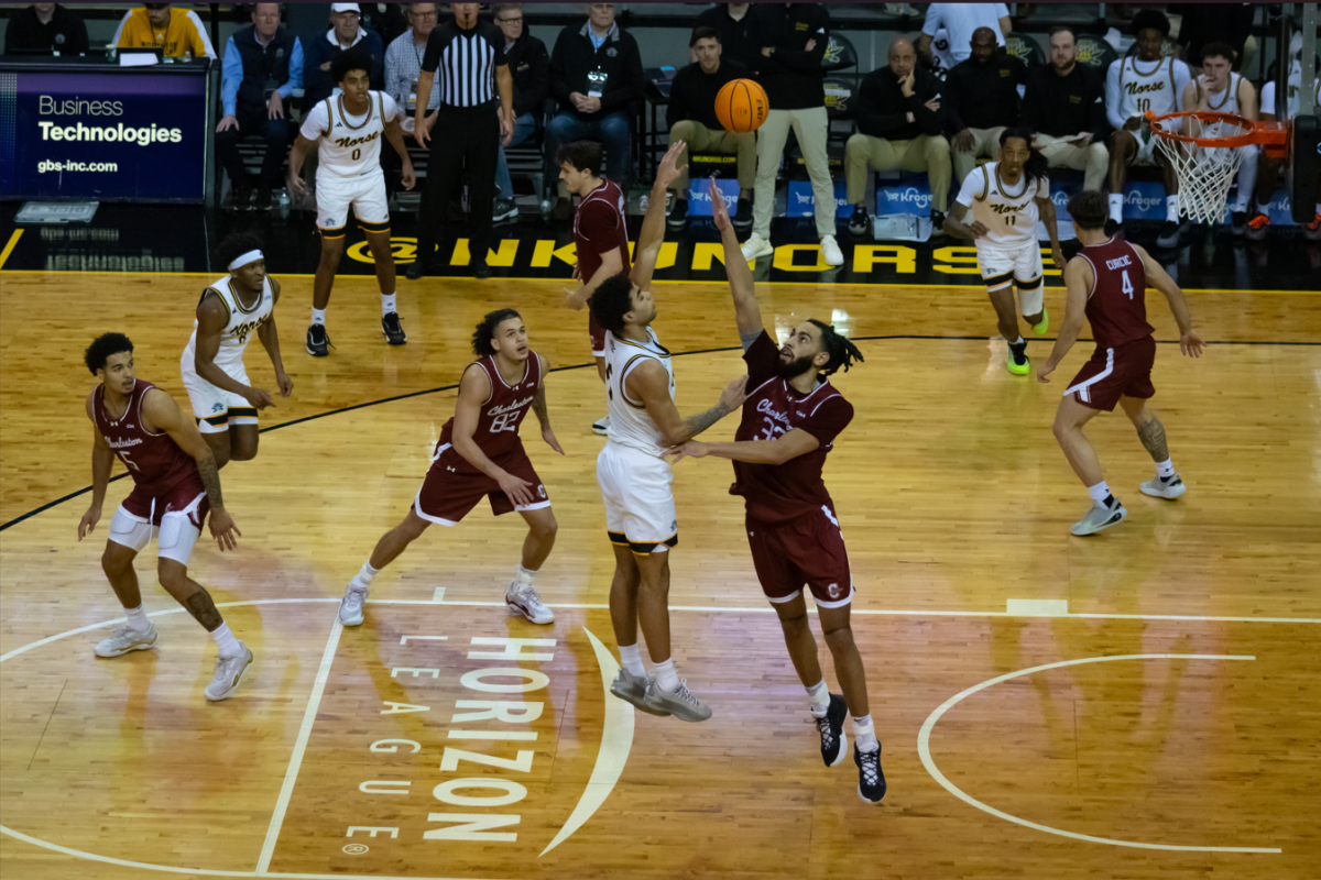 LJ Well (5) going for a hook shot over Christian Reeves (32). Wells had a quiet day, having seven points, six rebounds and two assists on 2-5 shooting from the field.