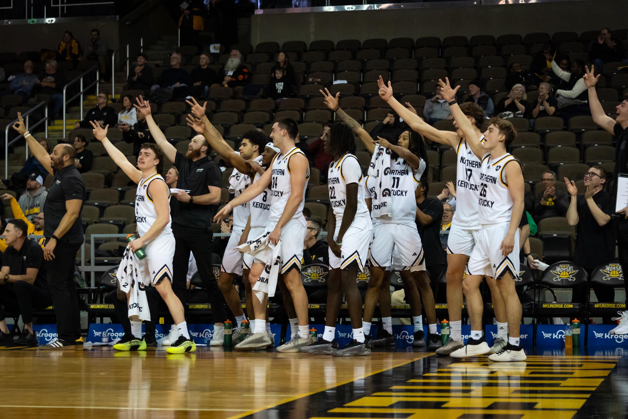 Men’s basketball celebrating a three-point made basket against Detroit Mercy. The Norse won big, 96-71, off a career night 35 points from LJ Wells.
