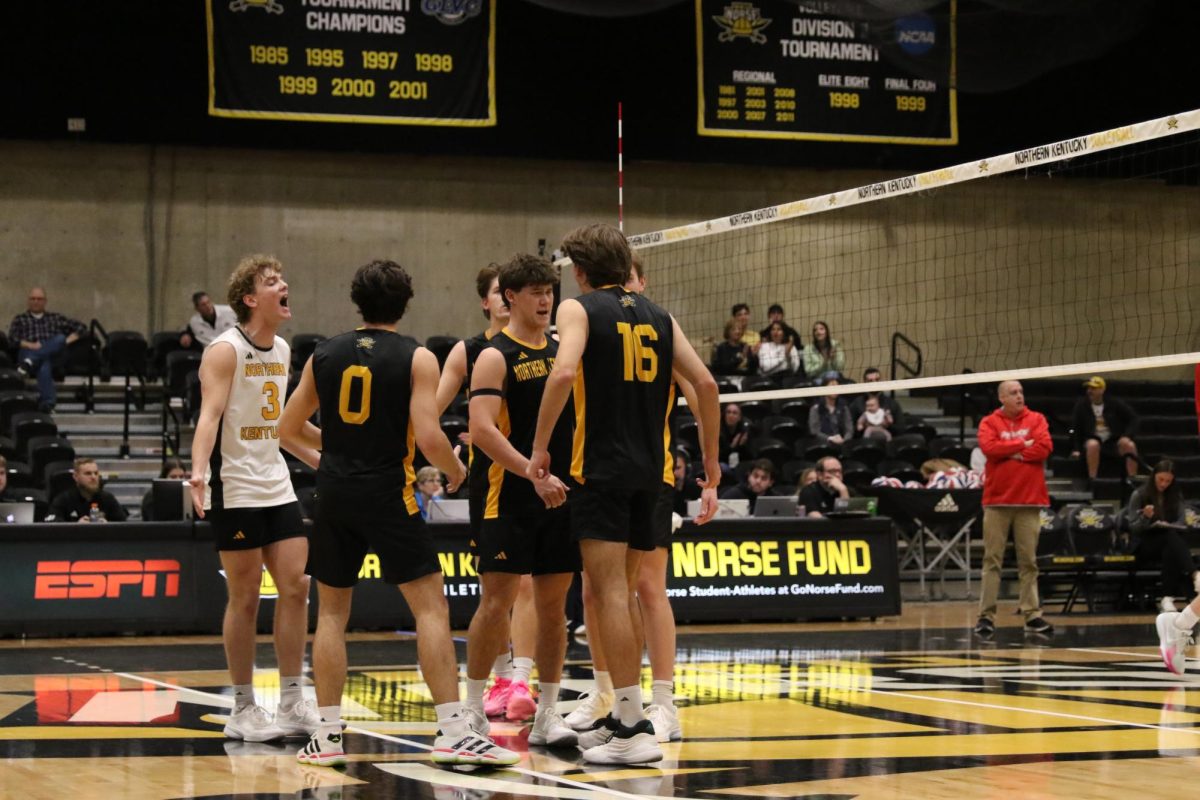 NKU Men’s volleyball celebrating a score against Saint Francis University. This was the second home match of their new season as they dropped the game 3-1.