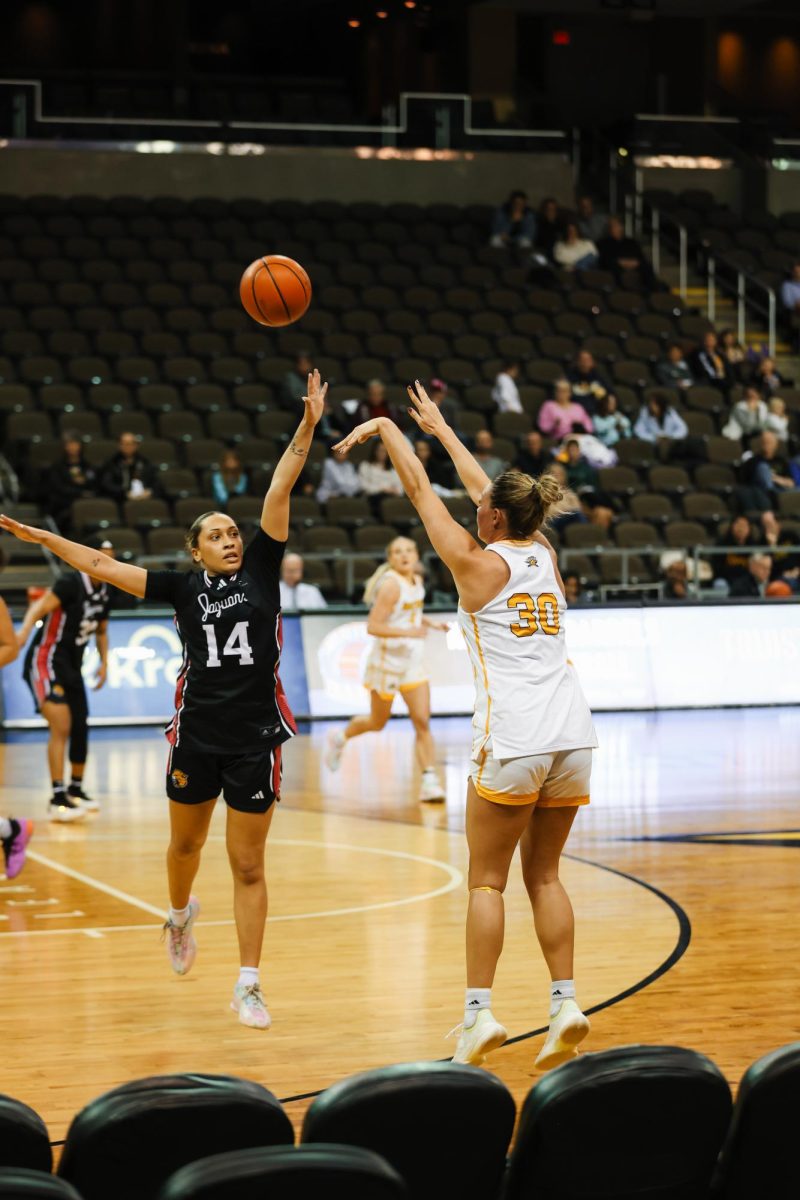 NKU’s Maddie Moody (30) getting a shot up against IU Indy’s Nevaeh Foster (14). Moody posted a double-double with 15 points, a career high 15 rebounds and added a career high four assists. 