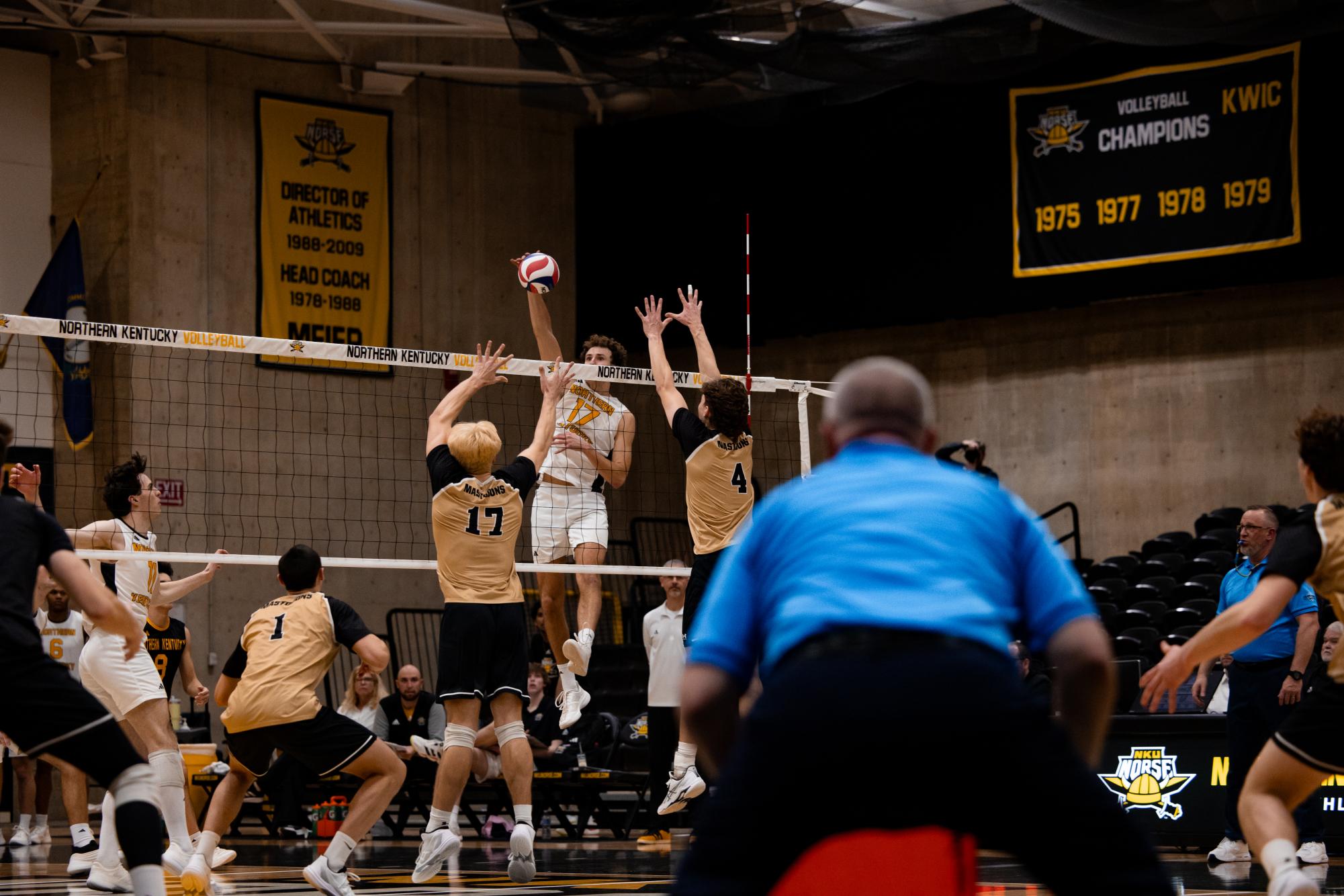 Junior Griffin Wheatley (17) going for the spike against Purdue Fort Wayne blockers. Wheatley had a solid performance against PFW on Feb.19, recording 11 kills on a .474 hitting percentage, three blocks and two digs.