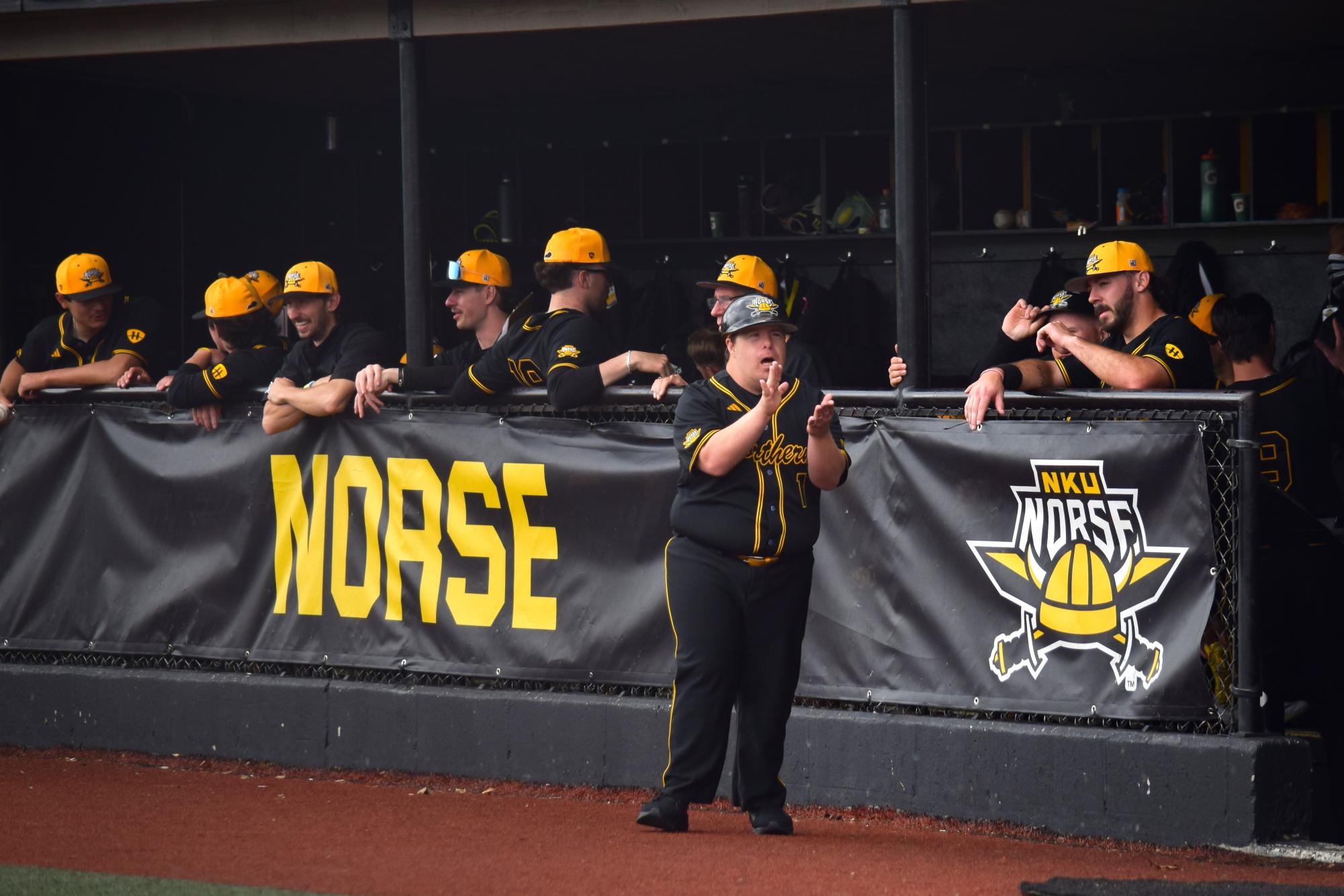 Ryan Mavriplis, special assistant to the head coach, hyping up the dugout.