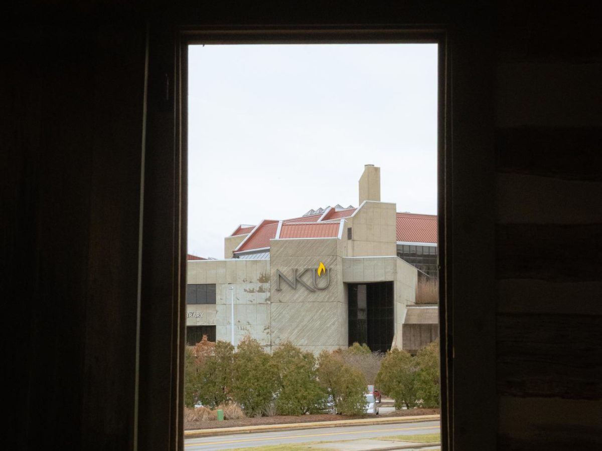 A view of Steely Library from inside the NKU log cabin. 